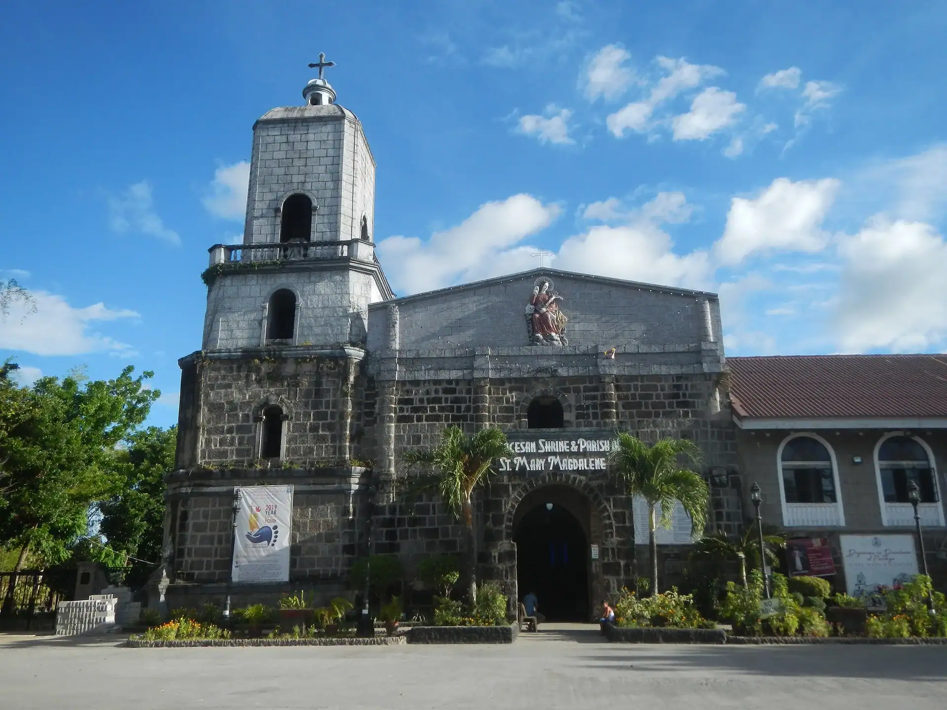 Diocesan Shrine and Parish of St. Mary Magdalene, Pililla, Rizal, under a blue sky