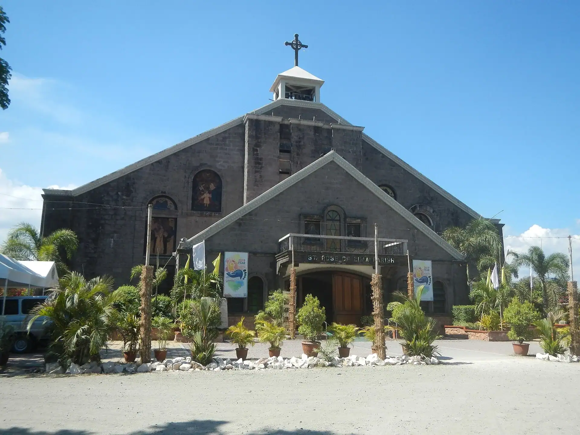 A parish church in Teresa, Rizal, under a blue sky